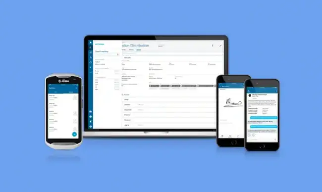Comparatio EDI and API platform interface shown across a laptop, tablet, and mobile phones